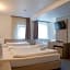 Alpha & Omega Hotel