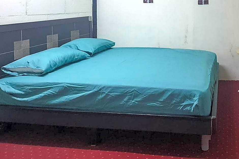 Rocky Guest House Syariah Mitra RedDoorz