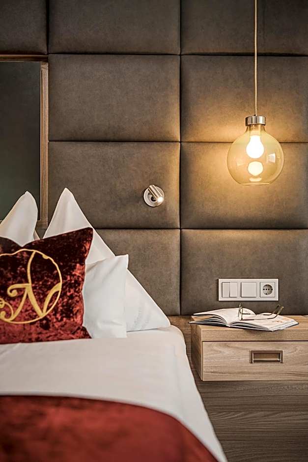 Hotel Norica - Thermenhotels Gastein mit dem Bademantel direkt in die Therme