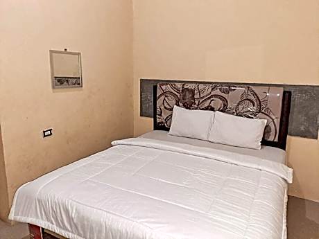 OYO Life 93590 Penginapan Palapa 10 Syariah