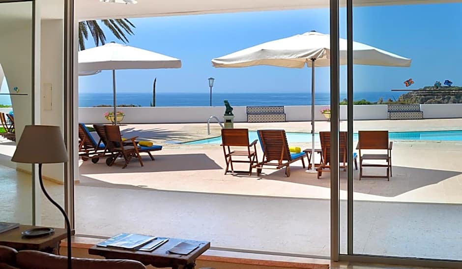 Casa Três Palmeiras