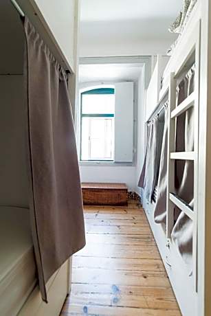 Bed in 12-Bed Female Dormitory Room