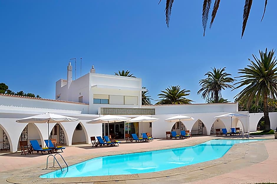 Casa Três Palmeiras