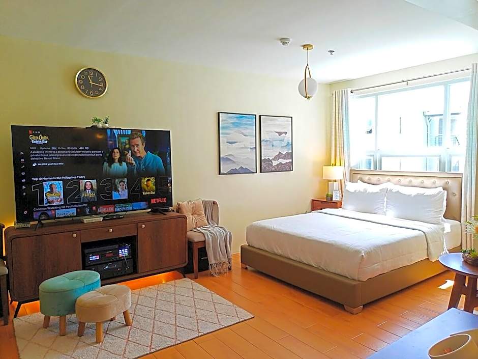 Photo 1 of 34 of Cozy Condo + Pool • Karaoke • 65" TV • Samal Ferry