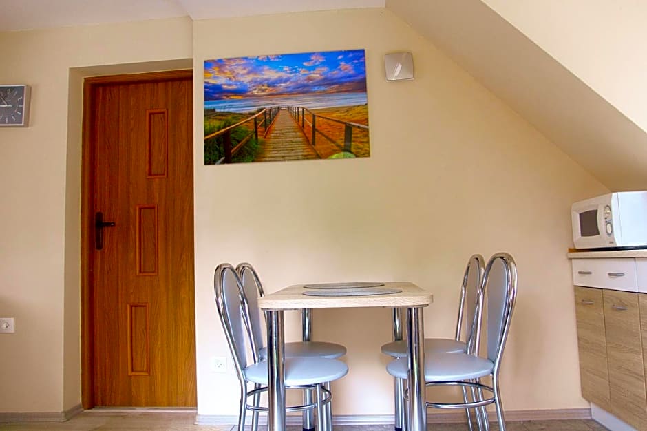 Sztil - Apartamenty i drewniane domki