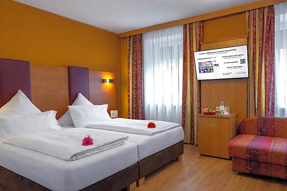 Tiptop Hotel Burgschmiet Garni
