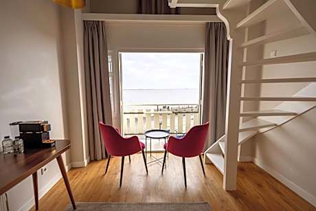 Suite with Two Single Beds and Sofa Bed