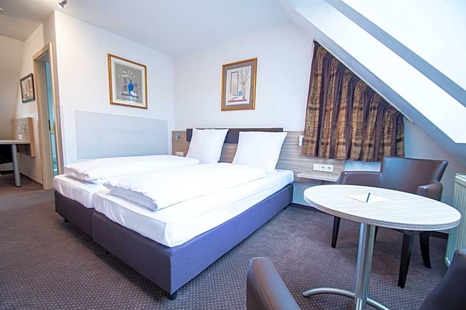 Photo 1 of 10 of Triple Room