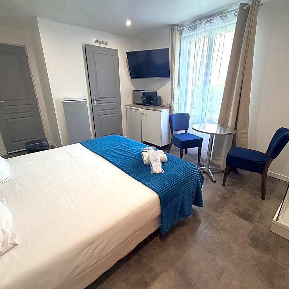 Aux Charmes-Suites cosy et independantes equipees d un frigo, micro ondes et nespresso