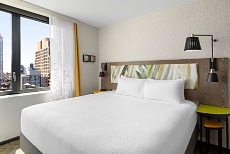 King Studio with Partial City View and Full Kitchenette - Mobility/Hearing Accessible w/Roll In Shower