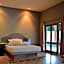 Tingala Lodge - Bed in the Bush