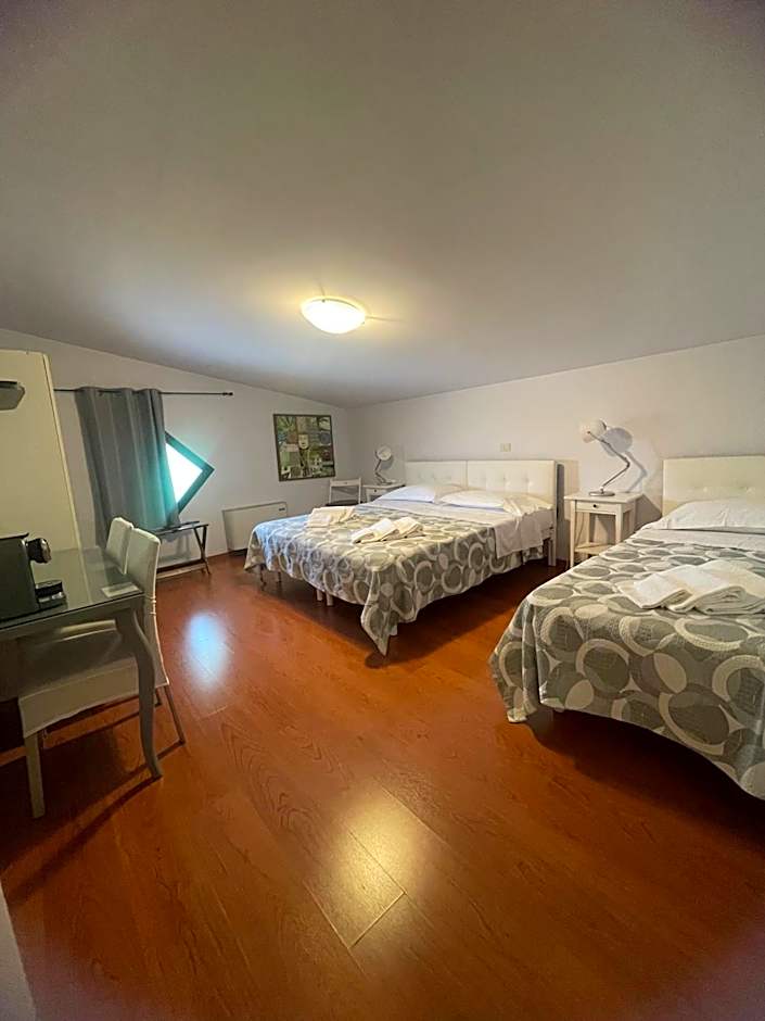 Photo 1 of 11 of Triple Room with Private Bathroom