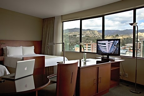 Junior suite two double beds room