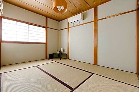 Quadruple Room with Shared Bathroom