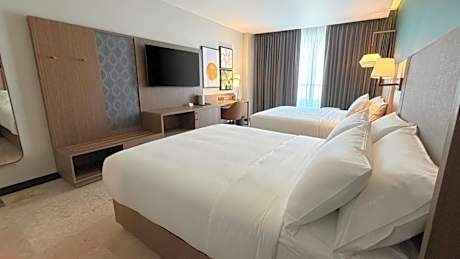Standard Queen Room with Two Queen Beds, Balcony and City View