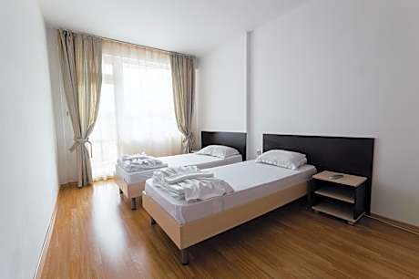 One-Bedroom Suite with Balcony (4 Adults)