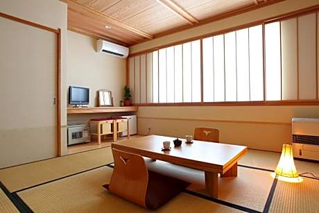 Economy Quadruple Room with Shared Bathroom