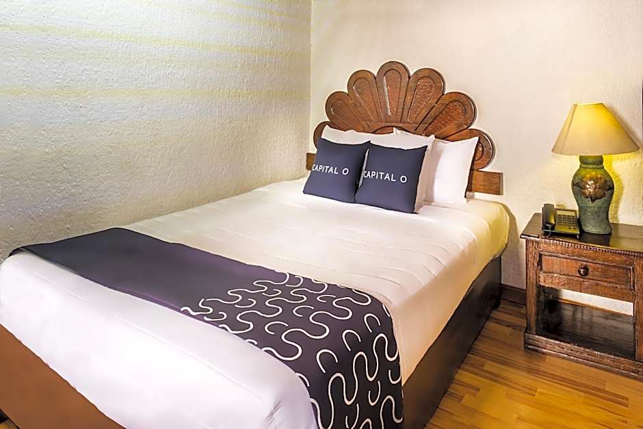 Capital O Hotel Central