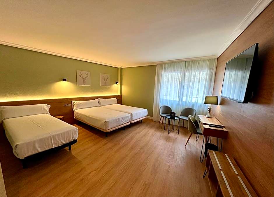 Photo 1 of 4 of Triple Room