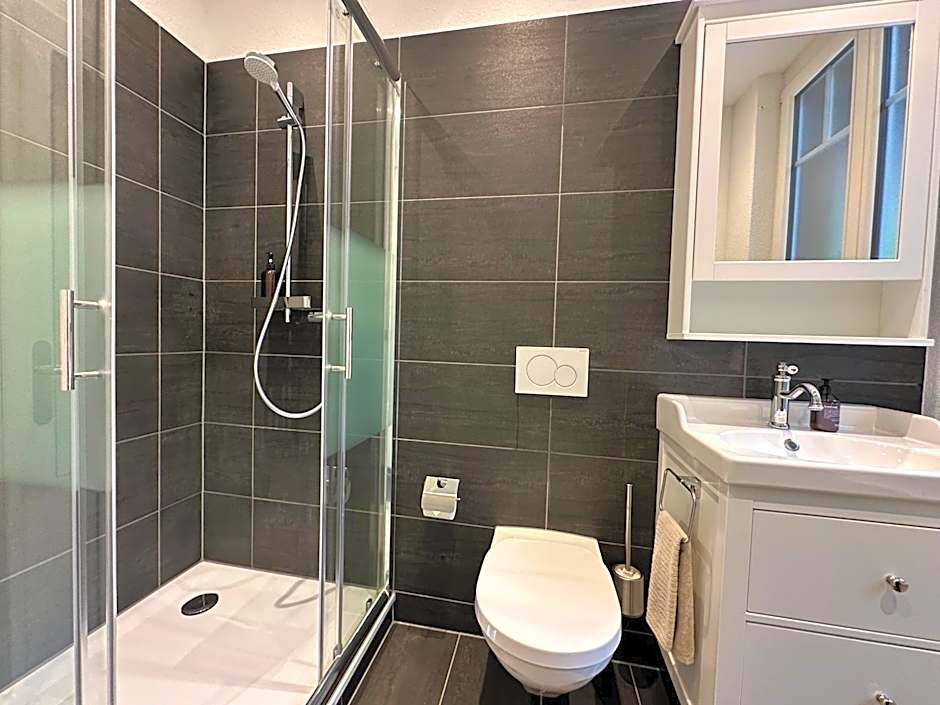 Boutique Hotel Niesenblick - direkt am Thunersee gelegen mit SELF CHECK IN & digitaler Rezeption