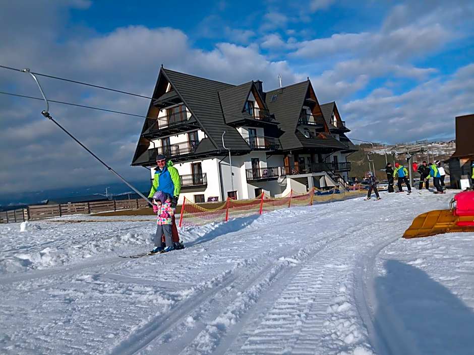 Aparthotel Rabiań-SKI 10metrów do wyciagu połączonego z całą Kotelnicą na miejscu wypoożyczalnia z serwisem
