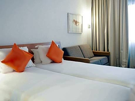 Superior Room With 2 Single Beds And Sofa