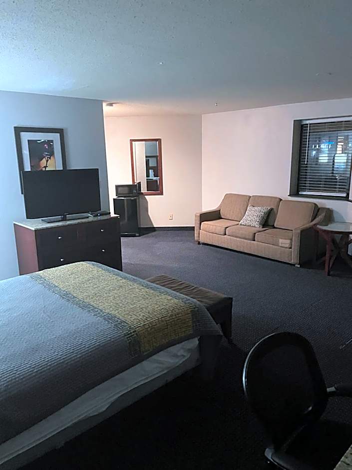 Apm Inn & Suites