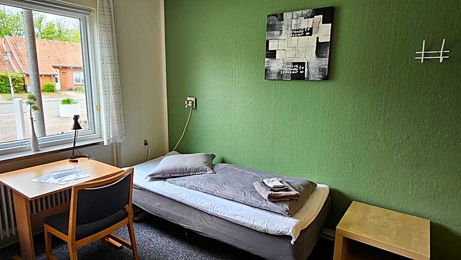 Photo 1 of 12 of Single Room with Shared Bathroom