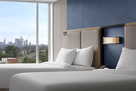 Guest room with 2 Queen, Trundle bed, City view