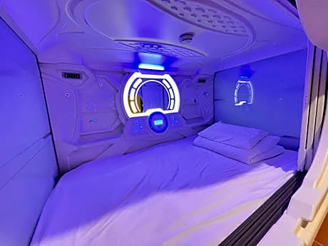 2capsule beds in dormitory room - no parking