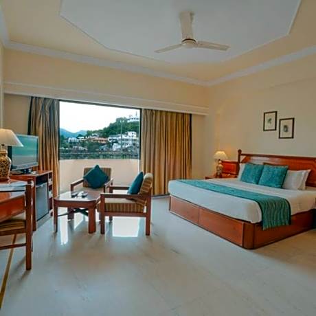 Queen Room with Balcony: 10% off on Spa, 5% off on two way Airport Transfer