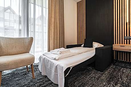 Double Room with Balcony (2 Adults + 1 Child)