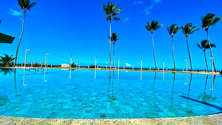 Refúgio Pé na Areia com 4 quartos em Ilhéus - Condomínio Perfeito para Família!