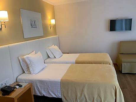 Double Room with Extra Bed (2 Adults + 1 Child)