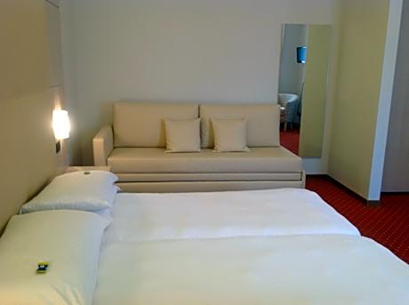 Triple Room (2 Adults + 1 Child)