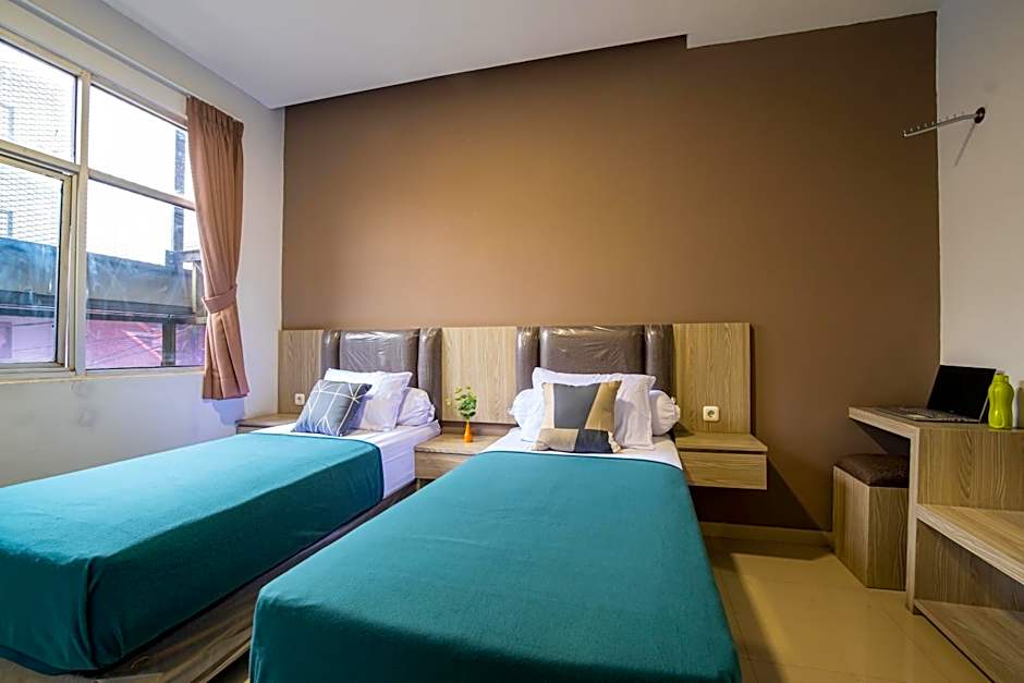 Kelowna Mangga Besar by AbdiHome