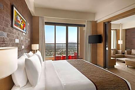Executive Suite with One King Bed - Living Room and Balcony - City or Garden View - Non-Smoking
