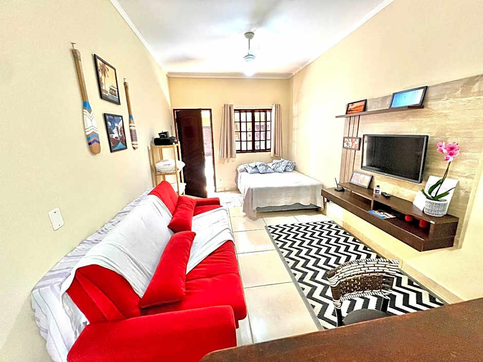 Studio pé na areia com área de churrasco privativa