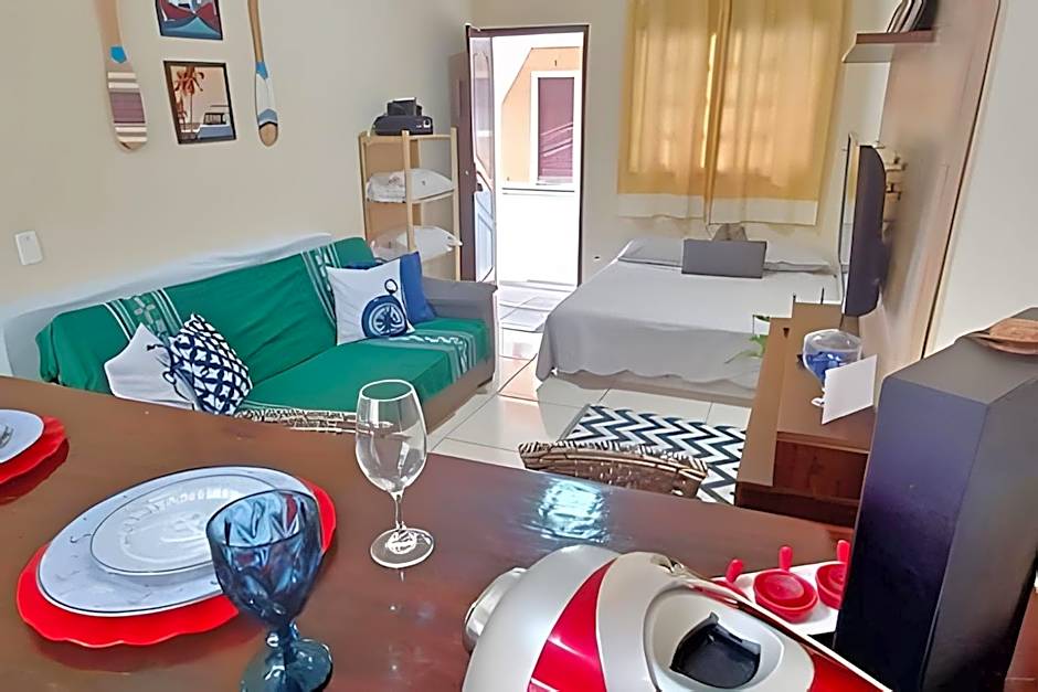 Studio pé na areia com área de churrasco privativa