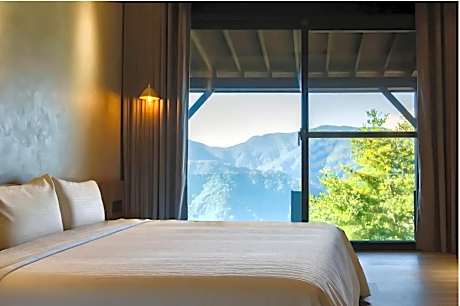 Deluxe Quadruple Room with Balcony