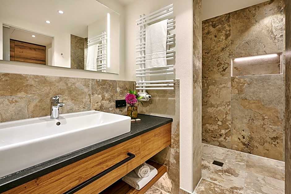 Hotel Auf der Gsteig GmbH