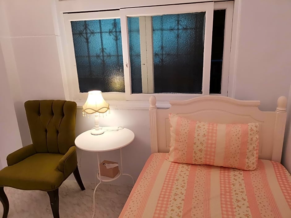 Photo 1 of 11 of Single Room with Shared Bathroom