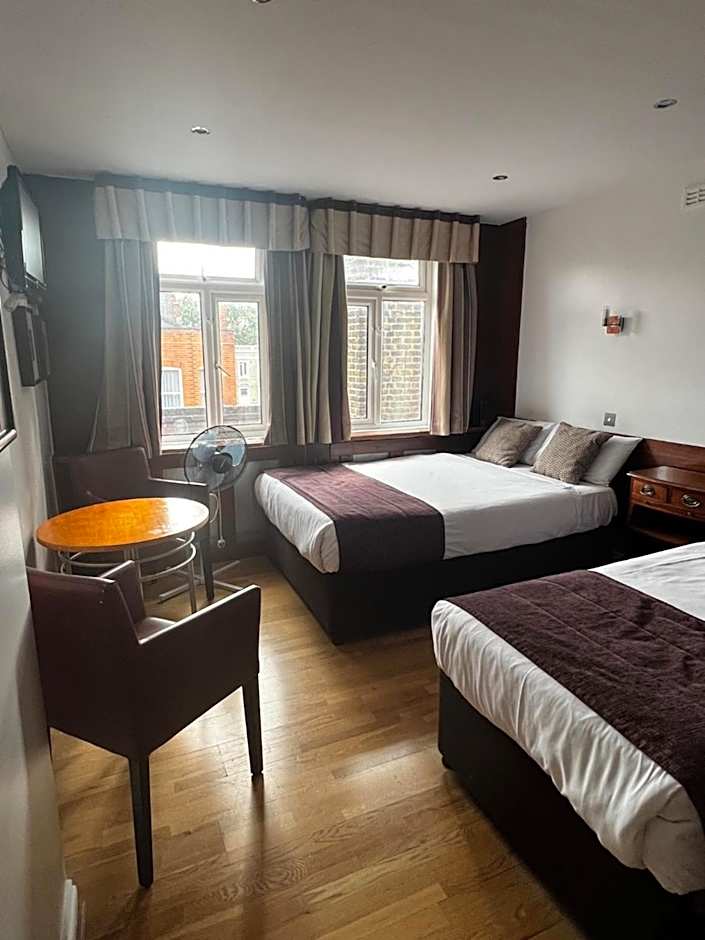 Photo 1 of 9 of Triple Room