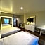 ASPIRE INN & SUITES Orange