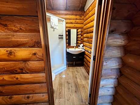 1 single bed in a 3 Bed Log Cabin Dorm (No Bunks)