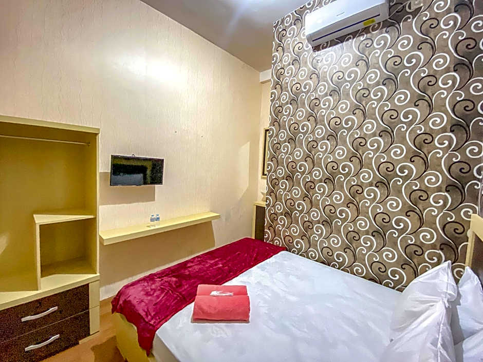 Tini's Guest House Malang Mitra RedDoorz