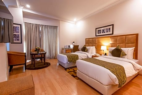 2 Single Beds Non-Smoking Deluxe Room Flat Screen Television Safe Mini Bar Wi-Fi