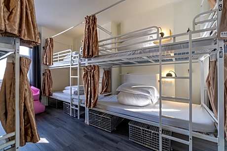 Bed in 8-Bed Female Dormitory Room