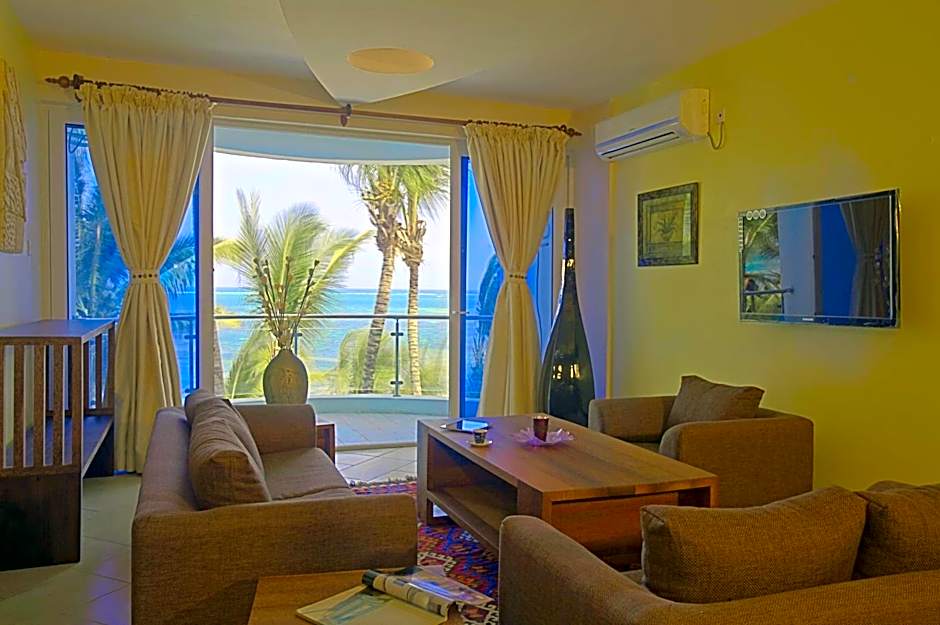 Cowrie Shell Beach Apartments Official