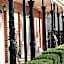 Carlyle Suites & Apartments